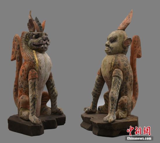 圖為慕容智墓出土鎮(zhèn)墓獸。 中新社發(fā) 甘肅省文物局 供圖